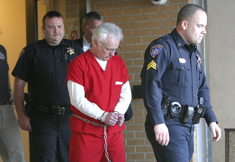 Former Sheriff Billy Long is led out of the Joel W. Solomon Federal Building after being sentenced to prison.