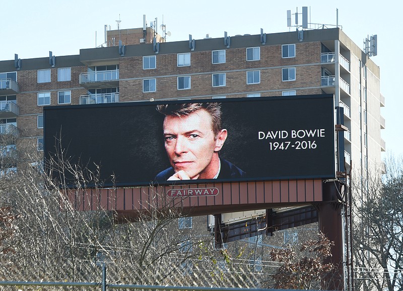 Fairway Outdoor Advertising put up 10 digital billboards in honor of the late British rocker David Bowie, like this one facing southbound traffic on U.S. Highway 27, at Stringers Ridge. The Pinnacle Condominiums can be seen directly behind the electronic sign.