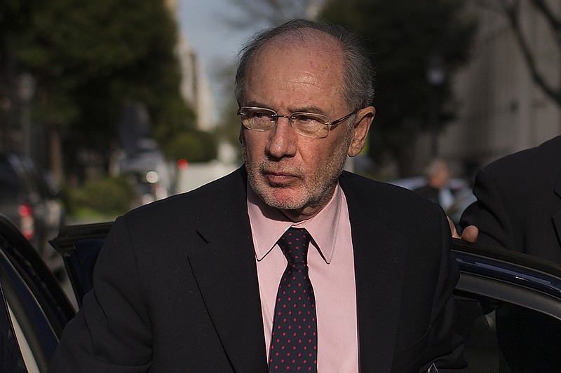 
              FILE - In this April 20, 2015 file photo, Spain's former Finance Minister and International Monetary Fund chief Rodrigo Rato arrives at his apartment in Madrid, Spain. Prosecutors are seeking a 4 and a half year jail term for ex-IMF chief, Rodrigo Rato in a criminal investigation into corporate credit card misuse by bank executives when he headed Spain’s Bankia group. The anticorruption prosecutors’ office said Thursday Jan. 14, 2016 that Rato was one of 66 people accused in the National Court investigation into the alleged use of "opaque" credit cards from the bank for irregular and undeclared expenses between 2003 and 2012. The bank had later to be bailed out. (AP Photo/Andres Kudacki, File)
            