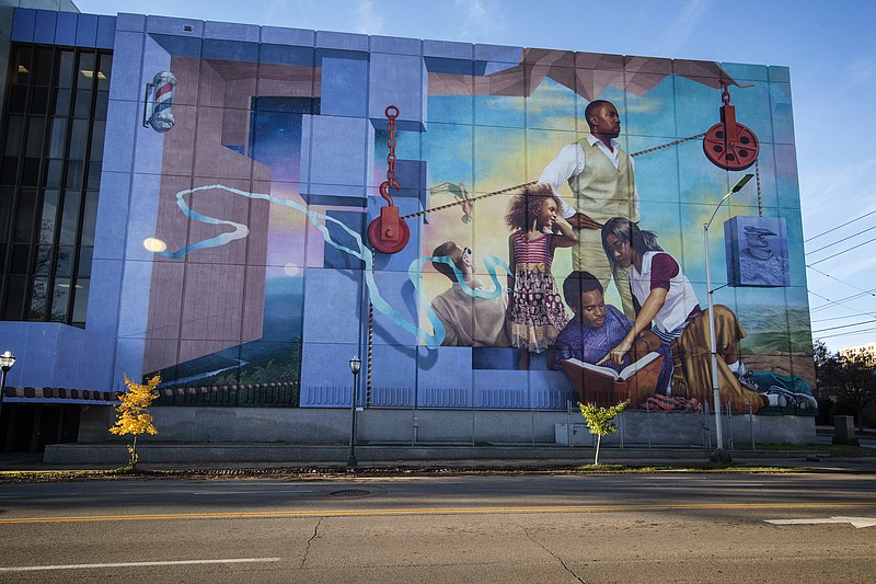 Meg Saligman and her team have transformed 42,000 square feet of vertical canvas into "M.L. King Mural: We Will Not Be Satisfied Until , " the largest mural in the Southeast and one of the five largest in the country.