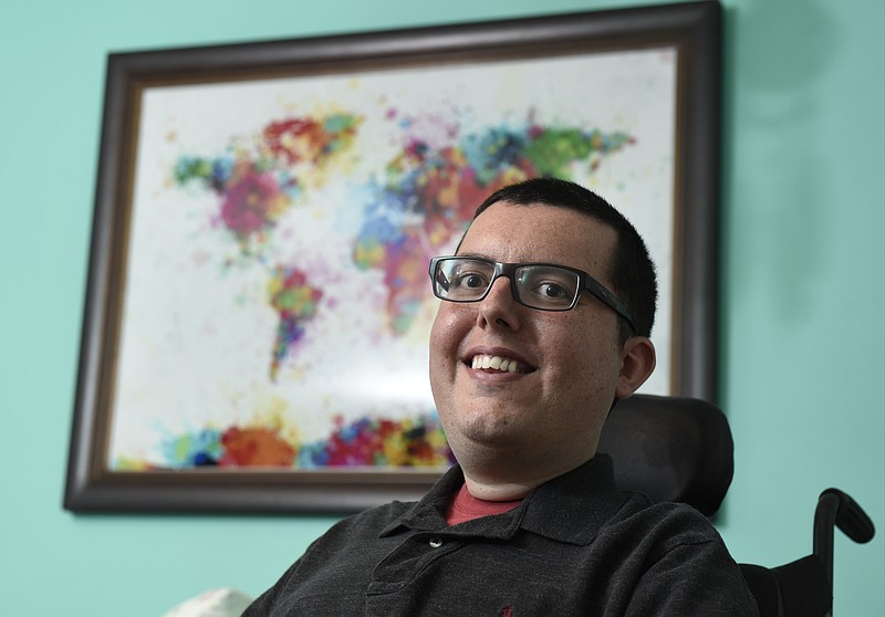Photographed at his home Tuesday, Jan. 12, 2016, near LaFayette, Ga., Cory Lee is a travel blogger who writes from the perspective of a person in a wheelchair. His internet blog is titled Curb Free.