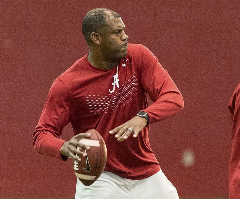 FILE - In this Dec. 2, 2015, file photo, Alabama assistant head coach/defensive backs Mel Tucker works with his players during football practice in Tuscaloosa, Ala. Kirby Smart completed filling his new Georgia staff on Tuesday, Jan. 12, 2016,  by hiring Alabama defensive backs coach and assistant head coach Mel Tucker as the Bulldogs' defensive coordinator. (Vasha Hunt/Alabama Media Group via AP, File)