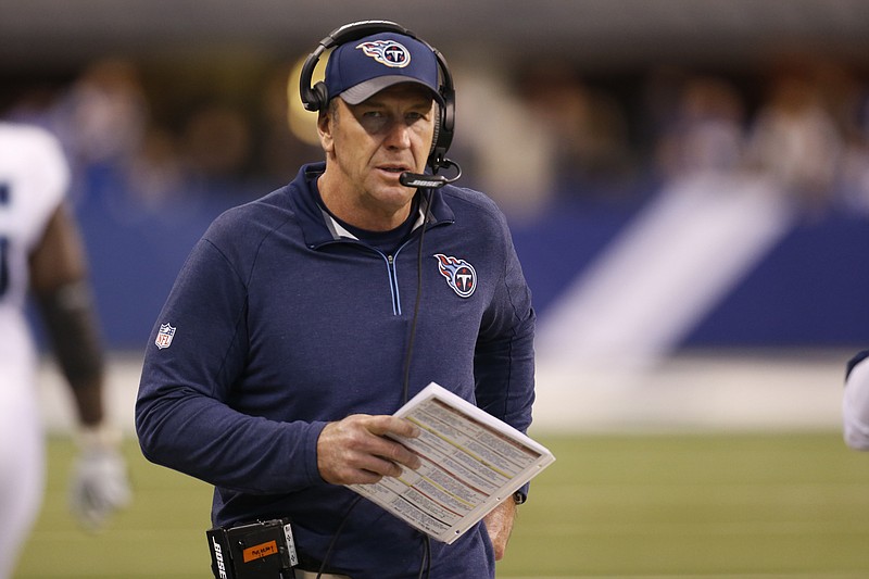 
              FILE - In this Sunday, Jan. 3, 2016 file photo, Tennessee Titans interim head coach Mike Mularkey looks on during the second half of an NFL football game against the Indianapolis Colts in Indianapolis. The Tennessee Titans have hired Mike Mularkey as their head coach, choosing to keep the man who handled the final nine games after they fired Ken Whisenhunt, Saturday, Jan. 16, 2016. (AP Photo/AJ Mast, File)
            