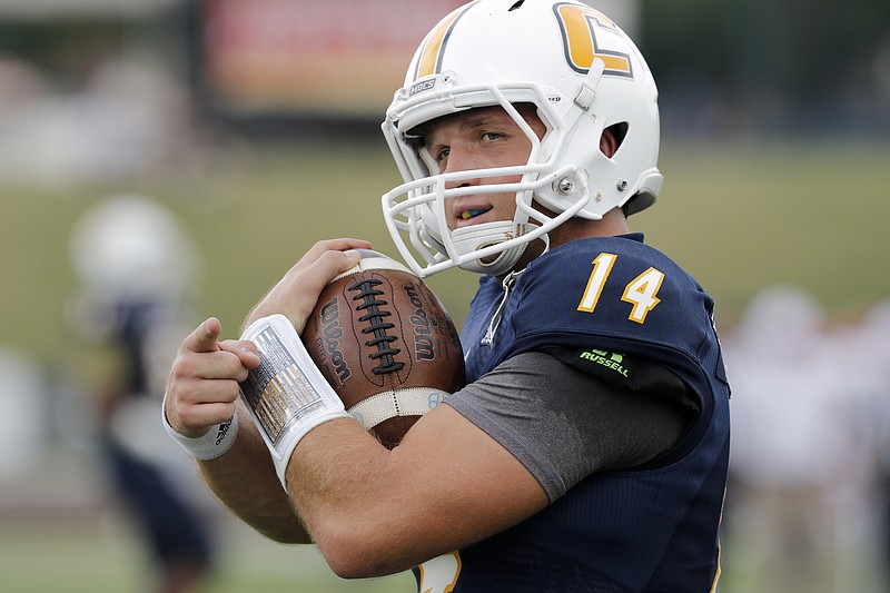 UTC quarterback Jacob Huesman warms up before the Mocs' season-opener football game against Jacksonville State at Finley Stadium on Saturday, Sept. 5, 2015, in Chattanooga, Tenn.