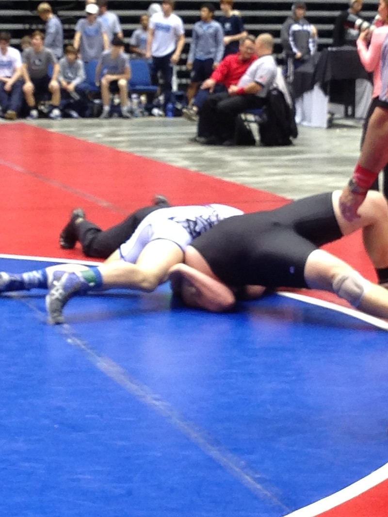 Trion heavyweight Seth Cox pins Treutlen County's Seth Love to clinch the Bulldogs' third-place finish in Class A at the GHSA Duals Championships on Saturday in Macon.