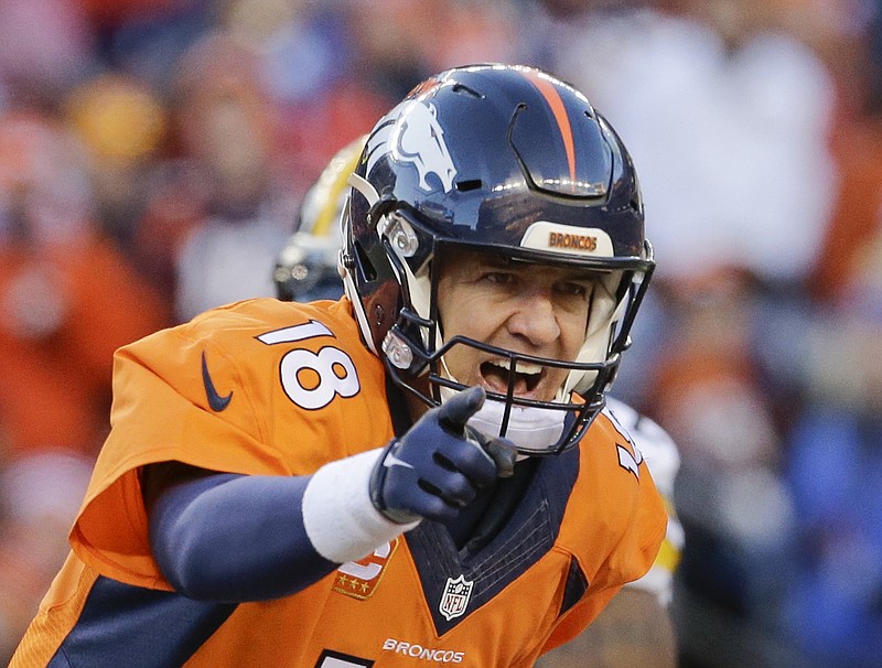 Broncos quarterback Peyton Manning yells to his team during the second half of Sunday's playoff game against the Pittsburgh Steelers in Denver.