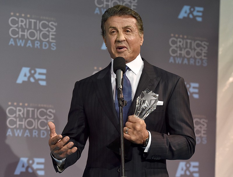 
              Sylvester Stallone poses in the press room with the award for best supporting actor for “Creed” at the 21st annual Critics' Choice Awards at the Barker Hangar on Sunday, Jan. 17, 2016, in Santa Monica, Calif. (Photo by Jordan Strauss/Invision/AP)
            