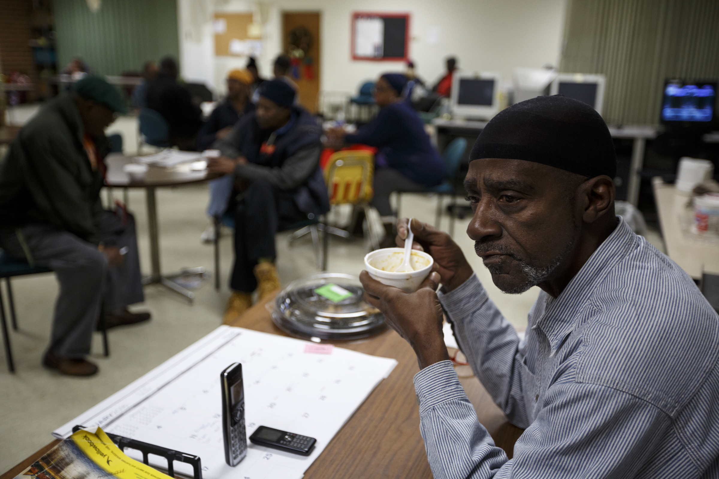 John Anderson eats gumbo inside the Boynton Terrace Apartments common area on Friday, Jan. 15, 2016, in Chattanooga, Tenn. Beginning last September, the restaurant Five Bar began serving free lunchtime meals at the Boynton Terrace apartments out of their food truck on Mondays, Wednesdays, and Fridays.