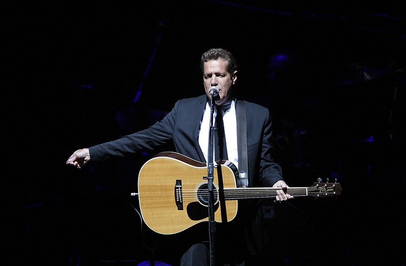 
              FILE - In this June 30, 2009, file photo, Glenn Frey, of the the Eagles, performs at Belfast's Odyssey Arena in Northern Ireland. Frey, who co-founded the Eagles and with Don Henley became one of history's most successful songwriting teams with such hits as "Hotel California" and "Life in the Fast Lane," has died at age 67. He died Monday, Jan. 18, 2016, in New York. (AP Photo/Peter Morrison, File)
            