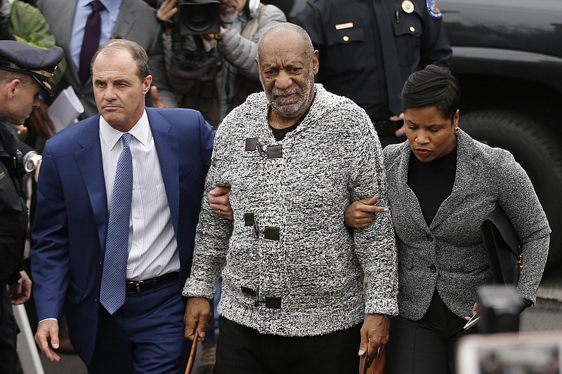 
              In this Wednesday, Dec. 30, 2015 photo Bill Cosby, center, accompanied by his attorneys Brian McMonagle, left, and Monique Pressley, arrives at court to face a felony charge of aggravated indecent assault, in Elkins Park, Pa. The attorneys hired to defend Cosby in the sex-assault case are a study in contrasts. McMonagle, 57, is expected to lead the defense arguments inside the courtroom when Cosby, 78, returns to court Feb. 2 in a crucial bid to have the case dismissed. (AP Photo/Matt Rourke)
            