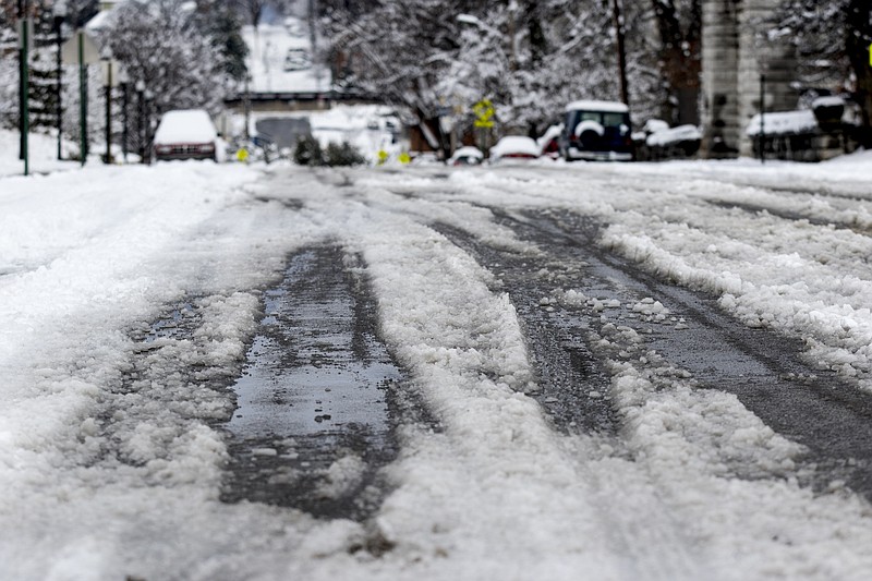 In this file photo, ice covers E. 5th Street on Thursday, Feb. 26, 2015, after heavy overnight regional snowfall blanketed the Chattanooga, Tenn., area.