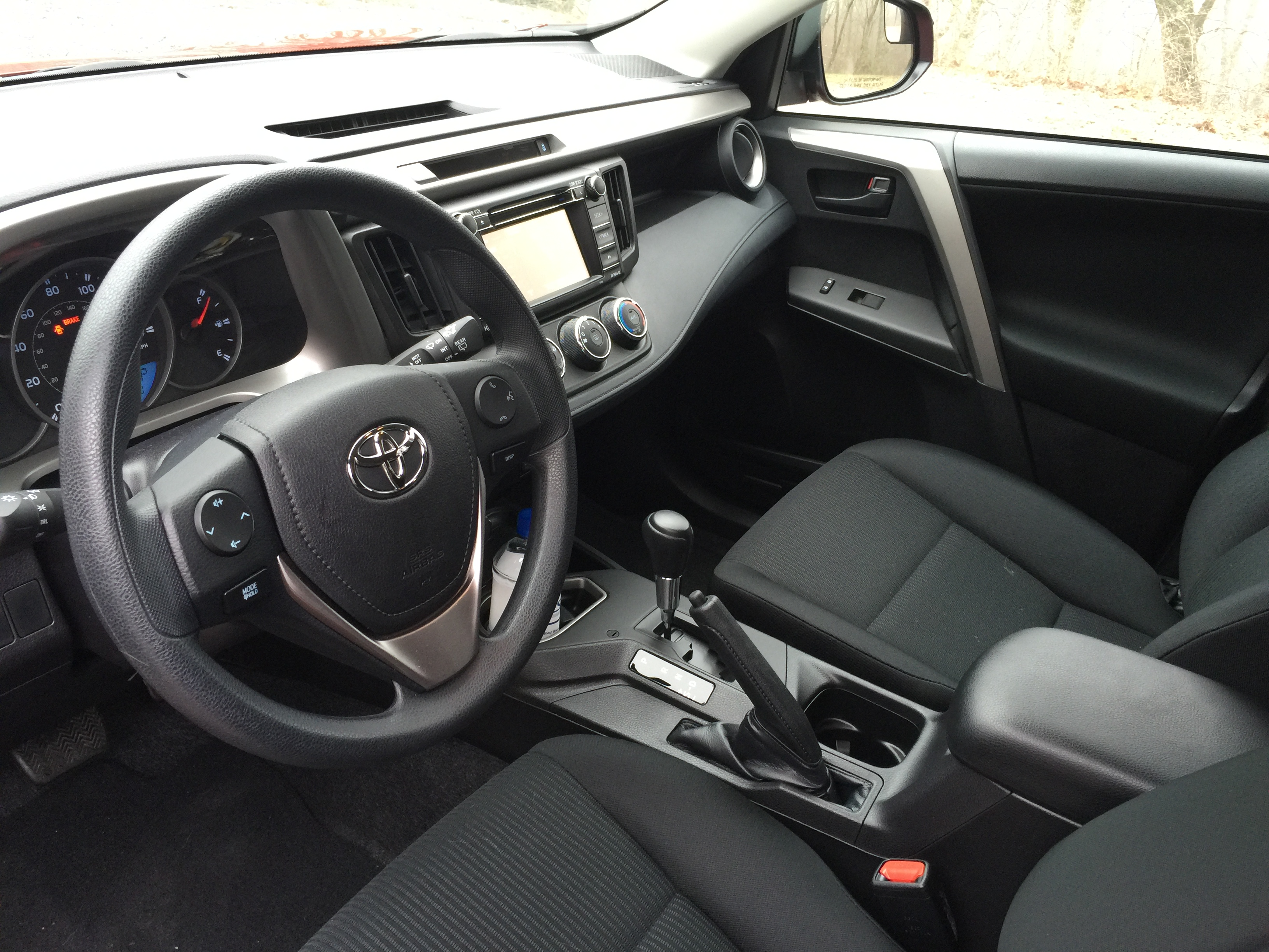 The interior of the 2016 RAV4 has been upgraded with more soft-touch surfaces.