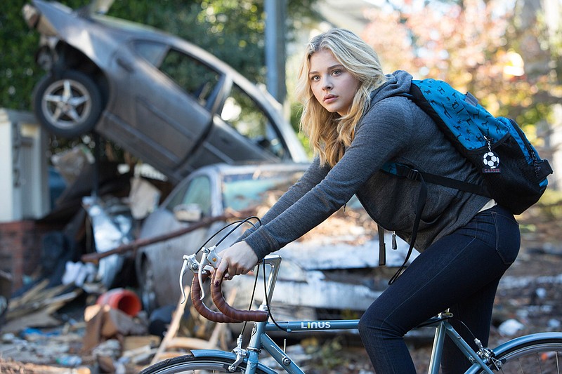 This photo provided by Columbia Pictures shows Chloe Grace Moretz as Cassie Sullivan in a scene from the film, "The Fifth Wave." The movie opens in U.S. theaters on Jan. 22, 2016.