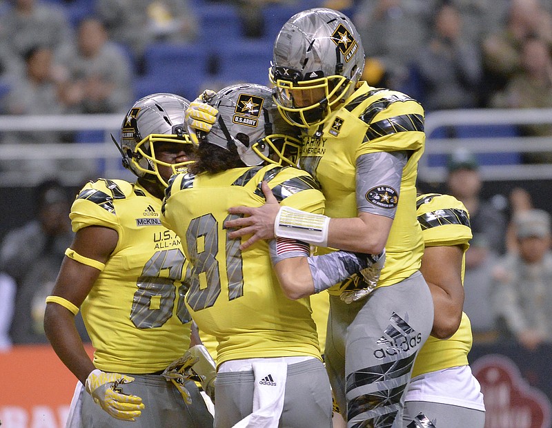 Quarterback Shea Patterson, top, was named MVP of the U.S. Army All-American Bowl earlier this month and has enrolled early at Ole Miss.