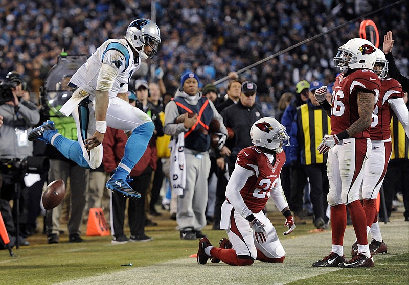 
              Carolina Panthers' Cam Newton celebrates a first down run during the second half the NFL football NFC Championship game against the Arizona Cardinals Sunday, Jan. 24, 2016, in Charlotte, N.C. (AP Photo/Mike McCarn)
            