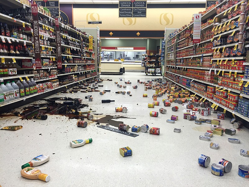 
              In this photo provided by Vincent Nusunginya, items fallen from the shelves litter the aisles inside a Safeway grocery store following a magnitude 6.8 earthquake on the Kenai Peninsula on Sunday Jan. 24, 2016, in south-central Alaska. The quake knocked items off shelves and walls in south-central Alaska and jolted the nerves of residents in this earthquake prone region, but there were no immediate reports of injuries. (Vincent Nusunginya via the AP)
            