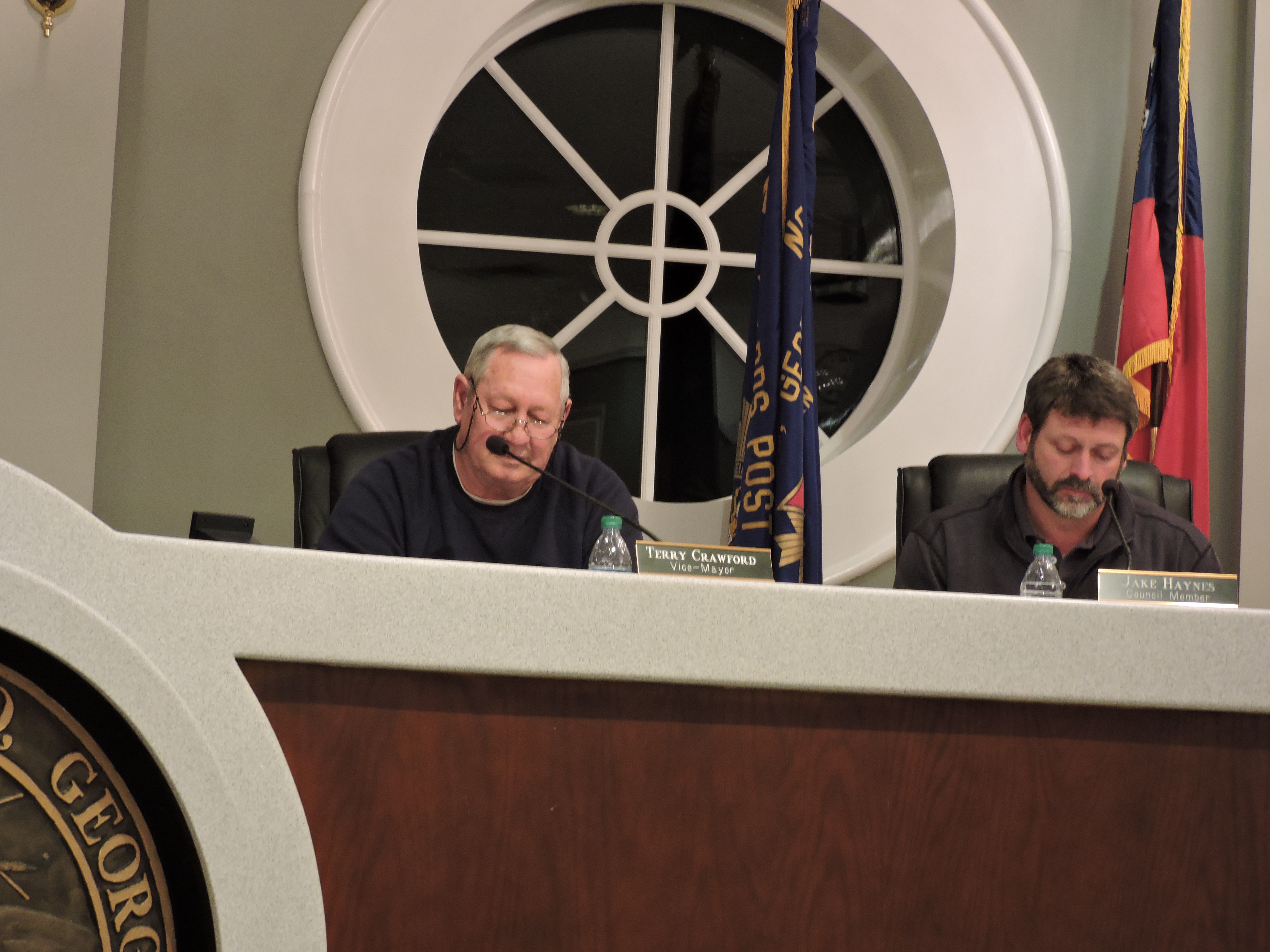 Ringgold Vice Mayor Terry Crawford, left, and Councilman Jake Haynes look over the Ringgold City Charter during a special called meeting.