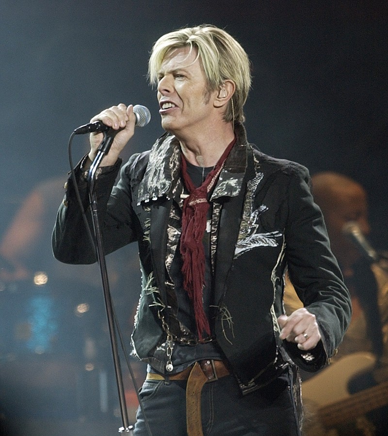 
              FILE - In this Dec. 15, 2003 file photo, singer/songwriter David Bowie launches his United States leg of his worldwide tour called "A Reality Tour," at Madison Square Garden in New York. A brief "60 Minutes" piece on the late David Bowie that aired Sunday, Jan. 24, 2016, was the result of a 15-year journey of missed connections involving three of the newsmagazine's correspondents and a rock star gone underground. Bowie talked about his artistry and getting old in interview clips from 2003 that were never aired before Sunday on "60 Minutes."  Bowie died Sunday, Jan. 10, after battling cancer for 18 months. He was 69. (AP Photo/Kathy Willens, File)
            