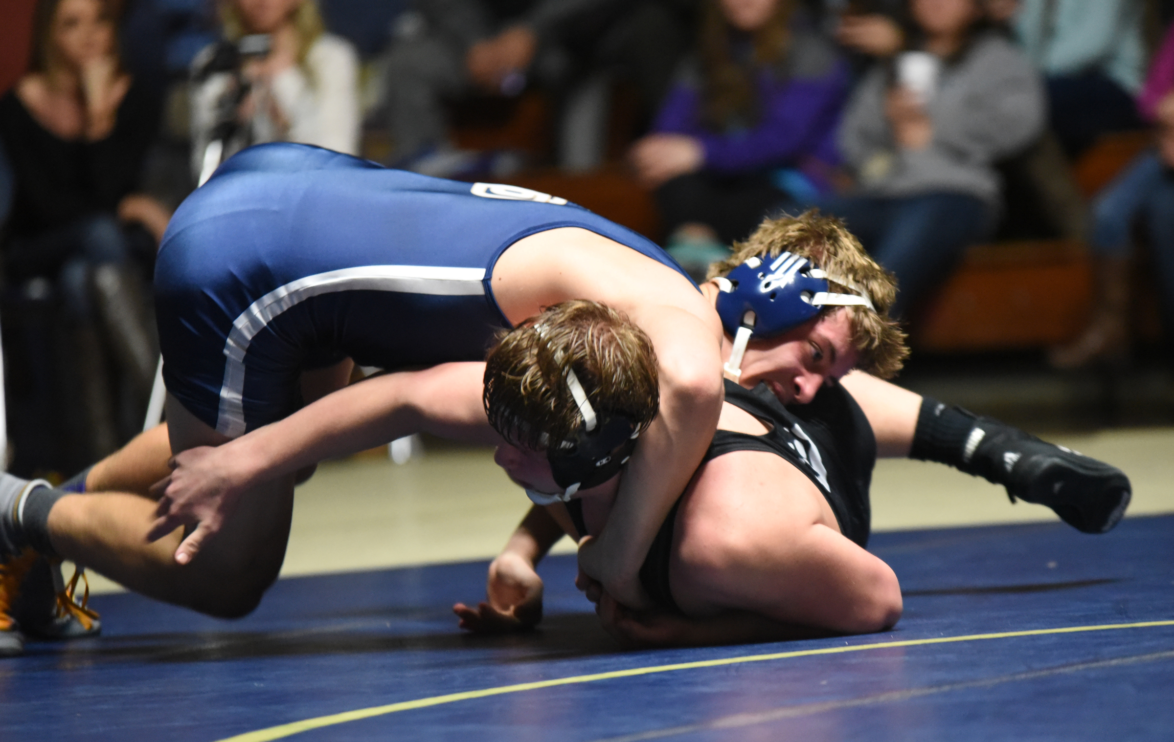 Soddy-Daisy's Ty Boeck, top, rolls Bradley Central's Kevin Gentry in the 182-pound weight class Tuesday at Soddy-Daisy. Boeck scored a major decision of 17-7.