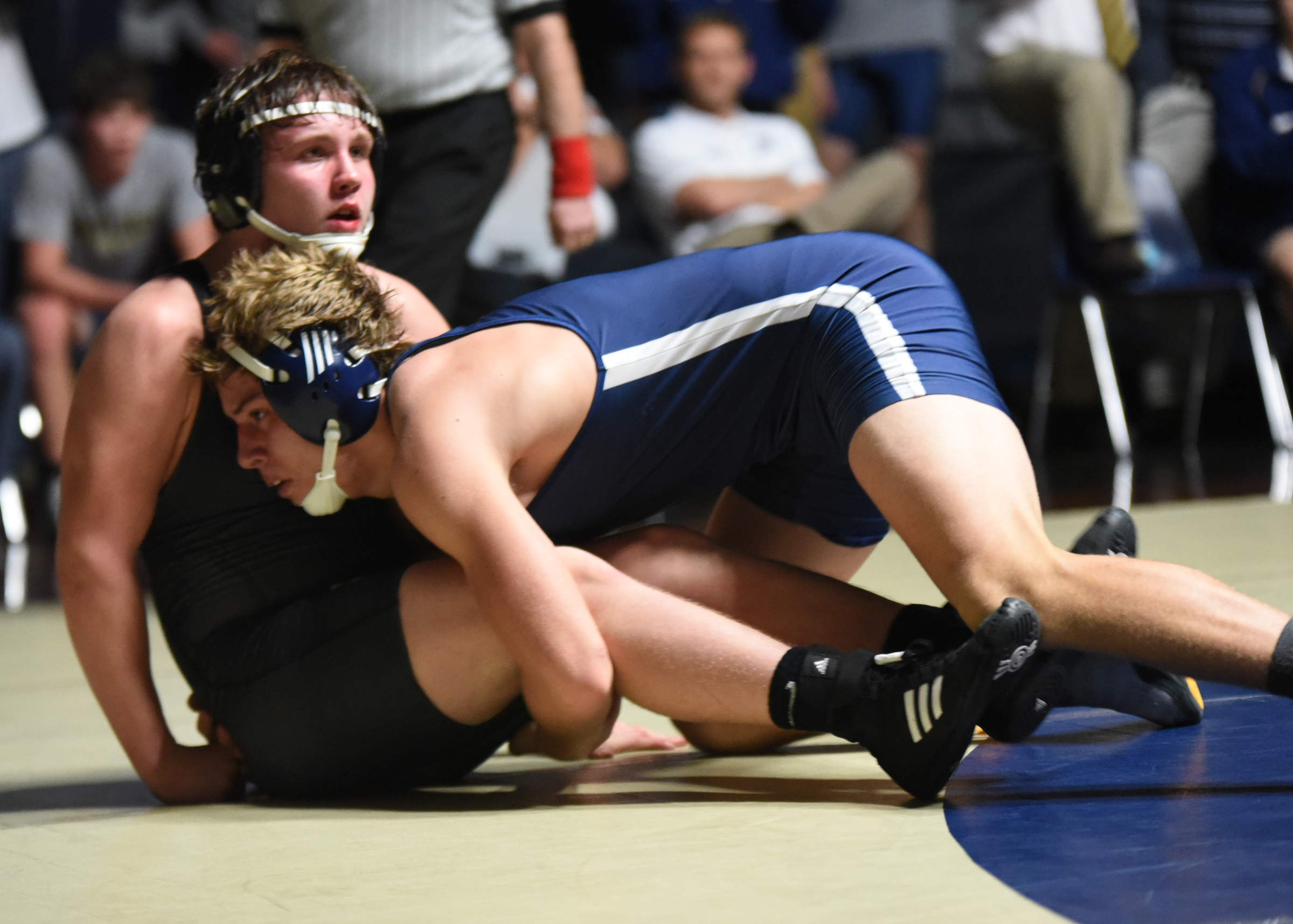 Soddy-Daisy's Ty Boeck, top, scores after a take down on Bradley Central's Kevin Gentry in the 182-pound weight class Tuesday at Soddy-Daisy. Boeck scored a major decision of 17-7.