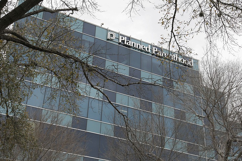 
              A Planned Parenthood clinic is seen Tuesday, Jan. 26, 2016 in Houston.  A Houston grand jury investigating undercover footage at the Houston clinic found no wrongdoing Monday, Jan. 25, 2016, by the abortion provider, and instead indicted anti-abortion activists involved in making the videos that targeted the handling of fetal tissue in clinics and provoked outrage among Republican leaders nationwide. (AP Photo/Pat Sullivan)
            
