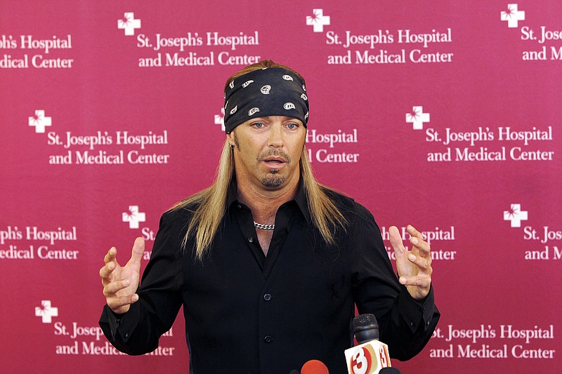 
              FILE - In this Oct. 27, 2011 file photo, Poison frontman Bret Michaels talks about the designs for a music room he will be funding and decorating at St. Joseph's Hospital and Medical Center Barrow Neurological wing in Phoenix.  A fire has destroyed a central Pennsylvania home where Michaels once lived as a child. Upper Allen Township Fire Chief Jim Salter says firefighters had trouble battling the Mechanicsburg fire Wednesday, Jan. 27, 2016  because nearby fire hydrants were buried in snow.  Mechanicsburg is about 8 miles southwest of Harrisburg, Pennsylvania’s capitol. (AP Photo/Ross D. Franklin)
            