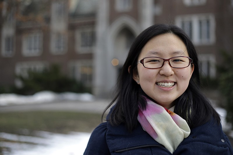 
              Linda Liu, of Beijing, a freshman at Wellesley College, poses on campus, Wednesday, Jan. 27, 2016, in Wellesley, Mass. During her college application process, Liu utilized a recorded interview service called "InitialView." American colleges sorting through record numbers of applications from China are turning increasingly to video-interviewing services to assess students’ language skills, get a feel for their personality _ and weed out fraudsters. (AP Photo/Elise Amendola)
            