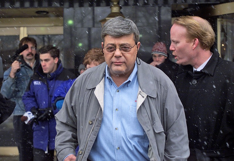 
              FILE - In this Dec. 5, 2002, file photo, former Providence, R.I., Mayor Vincent "Buddy" Cianci Jr., walks away from the media following an impromptu news conference outside the Biltmore Hotel where he was living in Providence, R.I.  Cianci died Thursday, Jan. 28, 2016, in Providence. He was 74. (AP Photo/Victoria Arocho, File)
            