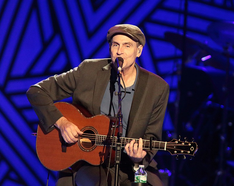 Singer-songwriter James Taylor performs in concert at the Giant Center on Thursday, July 9, 2015, in Hershey, Pa. (Photo by Owen Sweeney/Invision/AP)