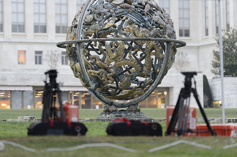 
              Camera tripods sit in front the United Nations building before the planned beginning of negotiations between the Syrian government and the opposition in Geneva, Switzerland, Friday, Jan.  29, 2016. (Martial Trezzini/Keystone via AP)
            