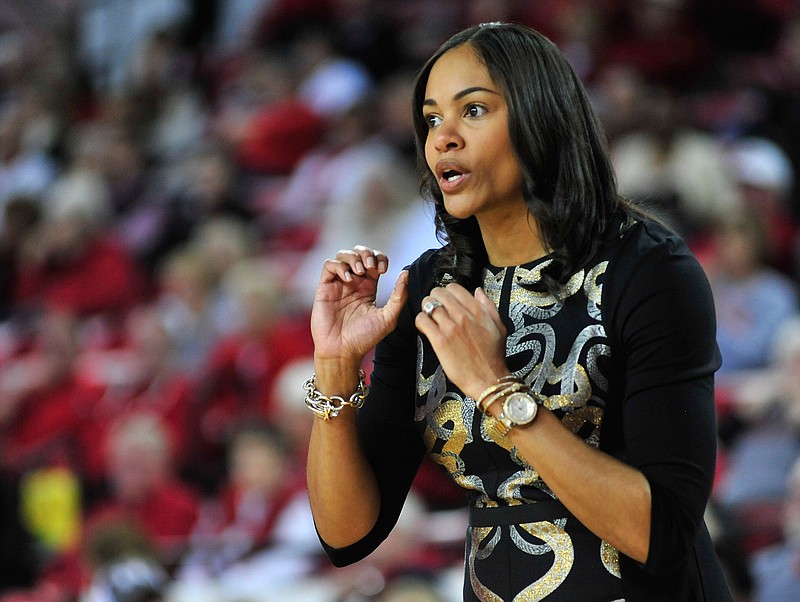 In this photo taken Sunday, Jan. 10, 2016, Georgia head coach Joni Taylor yells to a player during the first half of an NCAA college basketball game against Kentucky in Athens, Ga. Taylor's first season as head coach at Georgia has included an 11-game winning streak and a 3-5 start in the SEC. (AP Photo/Richard Hamm)