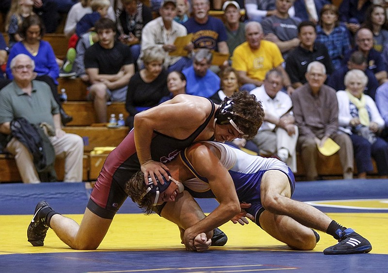 UTC's Mike Pongracz, right, wrestles Stanford's Tommy Pawelski during a match at Maclellan Gym this past November. Pongracz won by pin during Sunday's dual victory at Davidson, one of six victories worth bonus points for the Mocs.