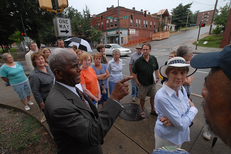 John Franklin Sr., former vice mayor and the first elected black official in Chattanooga, talks to guests during an event held by the Chattanooga History Museum about M.L. King Boulevard on Tuesday.