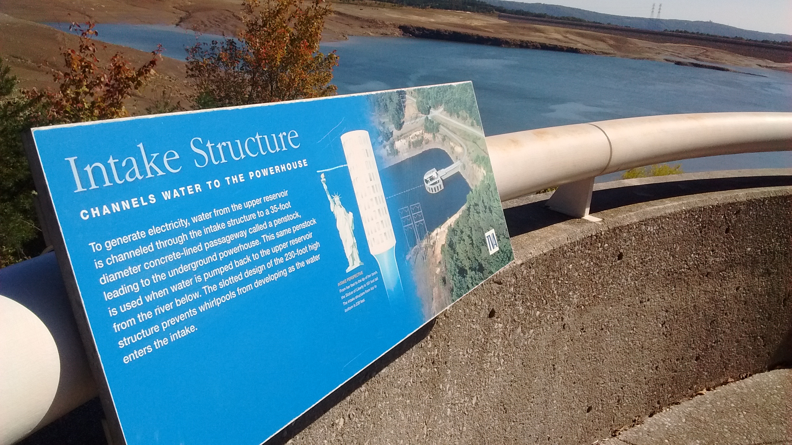 Staff photo by Tim OmarzuAn observation deck at the reservoir atop Raccoon Mountain shows how the intake structure is taller than the Statue of Liberty. Slots in the intake structure prevent whirlpools from developing as water is sucked into the intake to power the generators.