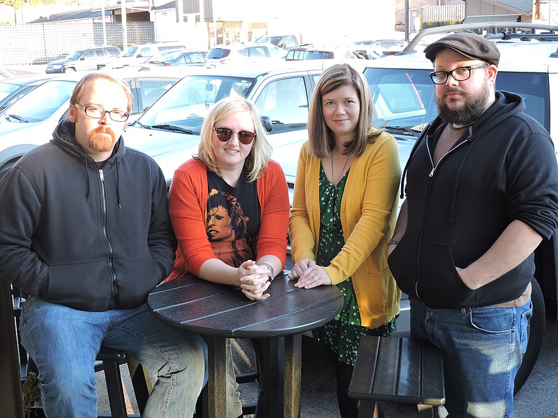 The Fort Bliss Band is ready to rock at local venues like JJ's Bohemia in downtown Chattanooga. From left are guitarist/vocalist Ken Welch, of LaFayette; keyboardist/bass guitarist Jennifer Weaver, of Ringgold; drummer Laura Ariks, of Brainerd; and her husband, rhythm/bass guitarist Russell Ariks, of Brainerd.