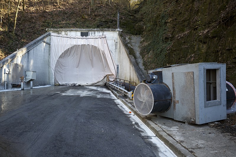 A curtain covers the southern entrance of the Wilcox Tunnel on Friday, Jan. 29, 2016, in Chattanooga, Tenn. The Wilcox tunnel remains closed for maintenance, and some Wilcox Boulevard businesses have expressed concerns about the continued closure's effect on their business.