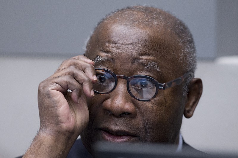 
              Former Ivory Coast president Laurent Gbagbo waits for the start of his trial at the International Criminal Court in The Hague, Netherlands, Thursday, Jan. 28, 2016. Gbagbo is in court along with a former youth minister Charles Ble Goude on charges of involvement in violence after 2010 presidential elections that left 3,000 people dead in Ivory Coast, once a haven of stability in West Africa. (AP Photo/Peter Dejong, Pool)
            