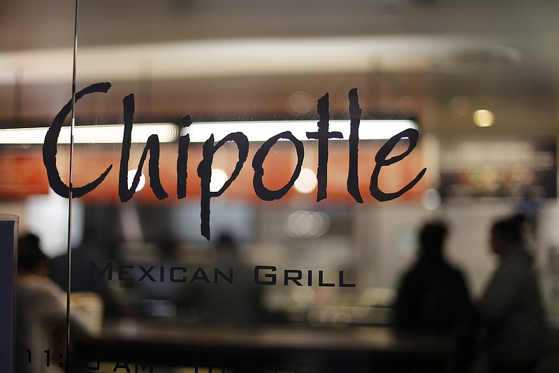 
              FILE - This Sunday, Dec. 27, 2015, file photo, shows a Chipotle restaurant in Union Station in Washington. The Centers for Disease Control and Prevention said Monday, Feb. 1, 2016, that the E. coli outbreak at Chipotle restaurants appears to be over, and that they are closing the investigation. (AP Photo/Gene J. Puskar, File)
            