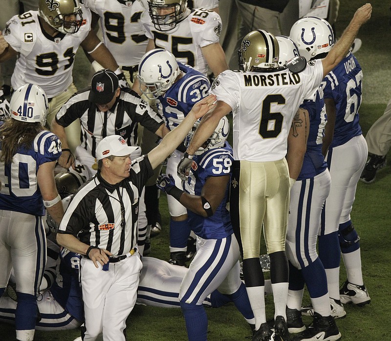 
              FILE - In this Feb. 7, 2010, file photo, an official signals that the New Orleans Saints will have possession of the ball after an onside kick, as New Orleans Saints punter Thomas Morstead (6) reacts during the second half of the NFL Super Bowl XLIV football game against the Indianapolis Colts, in Miami. The onside kick by Morstead is one of the memorable trick plays in Super Bowl history. (AP Photo/Charlie Riedel, File)
            