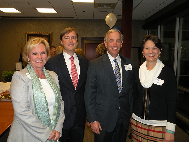 Representatives of Friends of Special Children, Southeastern Trust Company and Chambliss, Bahner & Stophel gather to celebrate the formation of the Friends of Special Children Pooled Trust. From left are FOSC President Anne Marie Stone, Southeastern Trust Managing Director Bart Rolen, and Michael St. Charles and Dana Perry of Chambliss, Bahner & Stophel.