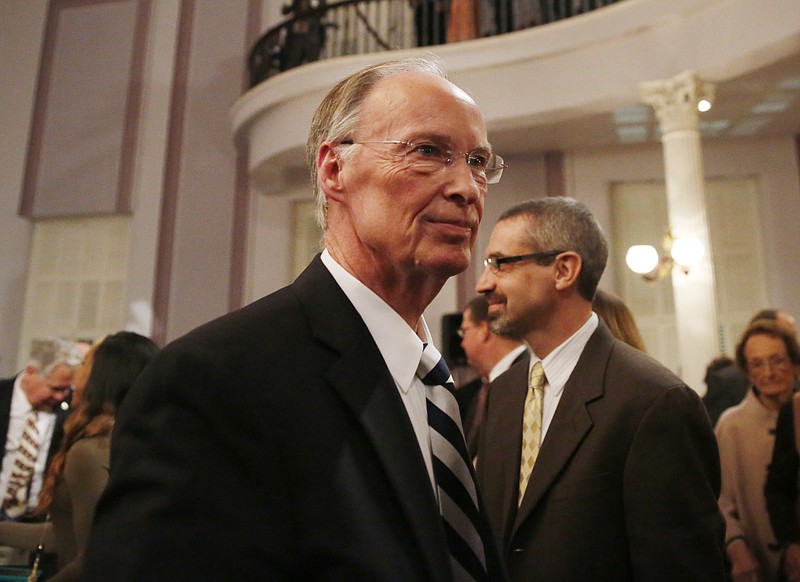 Alabama Gov. Robert Bentley walks towards the door after speaking during the annual State of the State address at the Capitol, Tuesday, Feb. 2, 2016, in Montgomery, Ala.