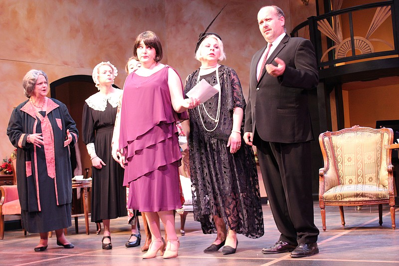 A telegram from Tony Cavendish in Hollywood tells the family he's in trouble … again. From left are Fanny Cavendish, the family matriarch (played by Kitty Reel); Delia, the maid (Melissa Moon McCollum), Gwen Cavendish, the third-generation actor (Megan Cobb, peering over the shoulder); Kitty Cavendish, Broadway's leading lady (Kendra Gross); Kitty Dean, an actress (Tosha Kranz); and Herbert Dean, her husband and Fanny's brother (Mike Pala).