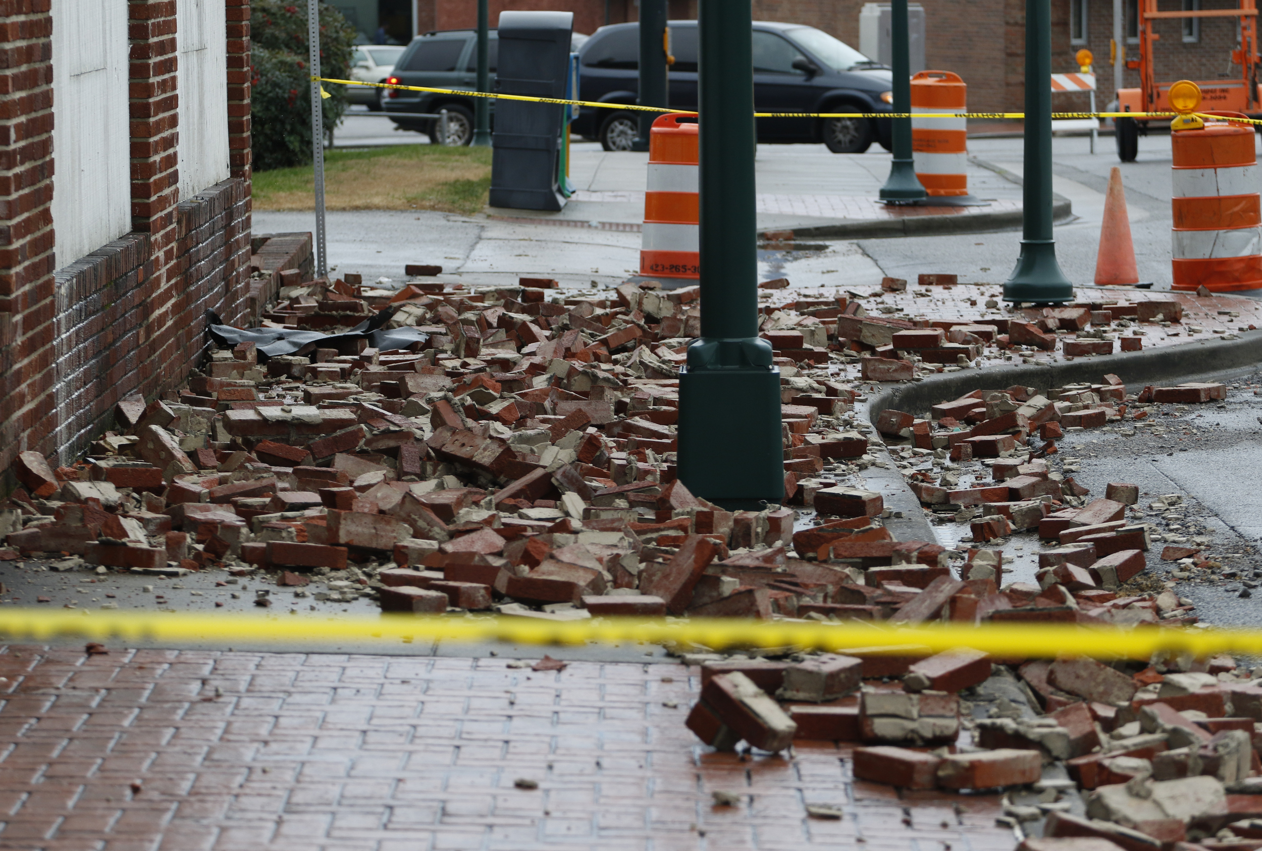 Staff Photo by Dan Henry / The Chattanooga Times Free Press- 2/3/16. Traffic is diverted just south of the State line on Wednesday, February 3, 2016, after overnight rains brought down a part of the Bingo hall's wall in Rossville, Ga.