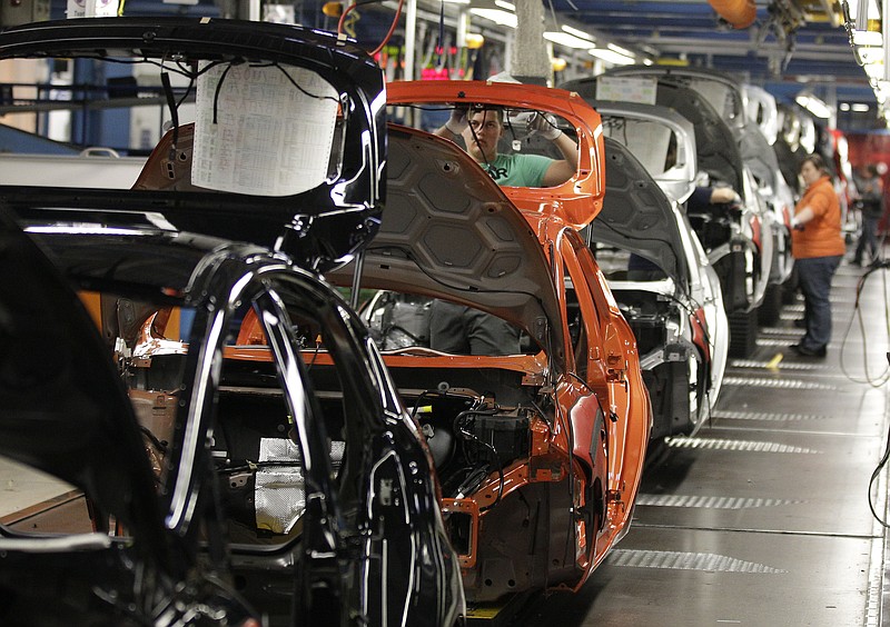 
              FILE - In this Feb. 9, 2012 file photo workers assmble the Ford Fiesta at the production line of the car manufacturer Ford in Cologne, Germany.  Ford Motor Co. is looking to cut hundreds of managerial jobs in Europe and phase out less profitable models as it seeks to improve slender profit margins there. The company said in a statement Wednesday that it was offering a "voluntary separation program" aimed at cutting administrative expenses and to save an additional $200 million annually. The job cutbacks will hit Ford's roughly 10,000 managers, mostly in Germany and Britain. The company says the numbers depend on how many people accept separation offers, but that several hundred are expected to. Ford Motor Co. is looking to cut hundreds of managerial jobs in Europe and phase out less profitable models as it seeks to improve slender profit margins there. The company said in a statement Wednesday that it was offering a "voluntary separation program" aimed at cutting administrative expenses and to save an additional $200 million annually. The job cutbacks will hit Ford's roughly 10,000 managers, mostly in Germany and Britain. The company says the numbers depend on how many people accept separation offers, but that several hundred are expected to. Ford Motor Co. is looking to cut hundreds of managerial jobs in Europe and phase out less profitable models as it seeks to improve slender profit margins there. The company said in a statement Wednesday Feb. 3, 2016  that it was offering a "voluntary separation program" aimed at cutting administrative expenses and to save an additional $200 million annually. The job cutbacks will hit Ford's roughly 10,000 managers, mostly in Germany and Britain. The company says the numbers depend on how many people accept separation offers, but that several hundred are expected to. (AP Photo/Frank Augstein, File)
            