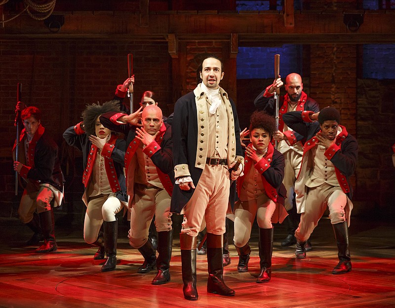 
              This image released by The Public Theater shows Lin-Manuel Miranda, foreground, with the cast during a performance of "Hamilton," in New York. The cast will perform at the Grammy Awards live via satellite from the Richard Rodgers Theatre in New York on Feb. 15.  (Joan Marcus/The Public Theater via AP)
            