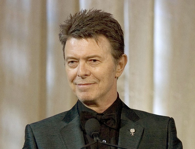 
              FILE - In this June 5, 2007 file photo, David Bowie attends an awards show in New York. The American Library Association said Wednesday, Feb. 3, 2016, that it has reissued a popular Bowie READ poster from 1987, part of the association’s program of using celebrities to promote literacy. Bowie, an avid reader, died last month at age 69. (AP Photo/Stephen Chernin, File)
            