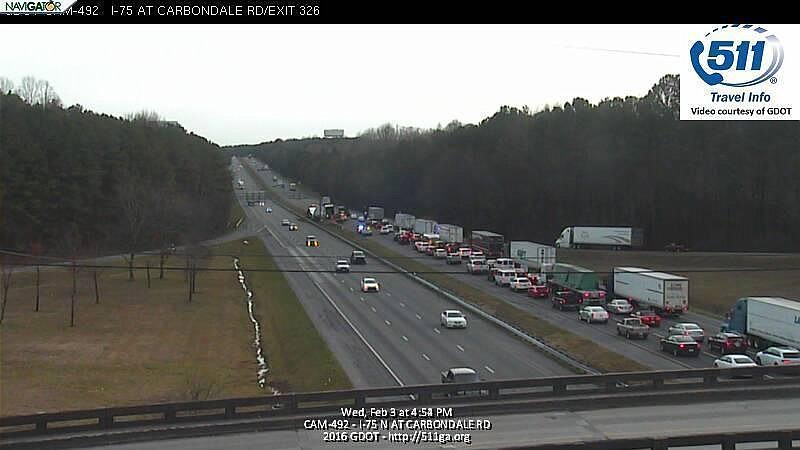 A tractor trailer crash on I-75 has shut down both lanes of southbound traffic, turning the interstate into a more than two mile-long parking lot between Dalton and Calhoun. 