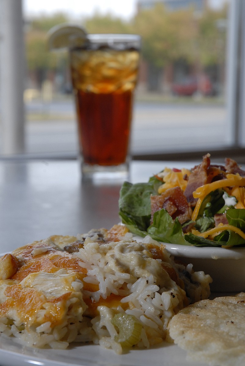 Southern Star's chicken and rice casserole is a house specialty served with a seven-layer salad, Lacey cornbread and a sweet tea at the restaurant on Broad Street. The casserole is made with rice, celery, onion, chicken and a cream of mushroom sauce.