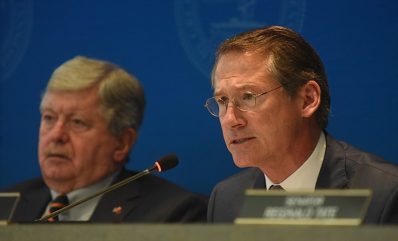 State Sens. Bo Watson, right, and Randy McNally participate in a legislative hearing at the Hamilton County Department of Education in Chattanooga, Tenn., on Thursday, October 29, 2015. State Sen. Bo Watson held the meeting to discuss state incentives used for Volkswagen's Chattanooga plant expansion.