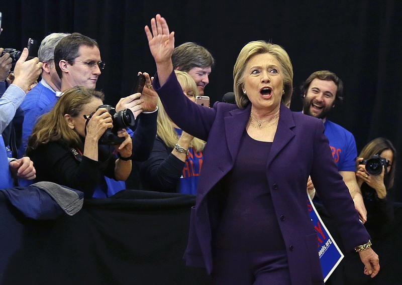 Democratic presidential candidate Hillary Clinton waves as she arrives at a campaign event on Tuesday in Nashua, N.H.